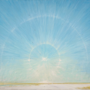 Zon met dubbele halo boven de Waal